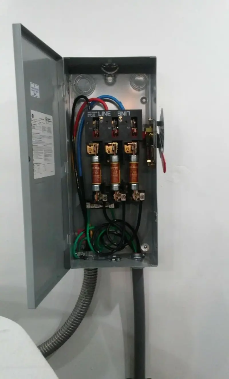 Three-phase disconnect switch installed for Smoke Detector Installation in Seaside